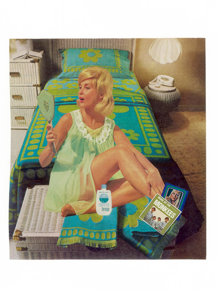 Hand-cut paper collage artwork using vintage ephemera